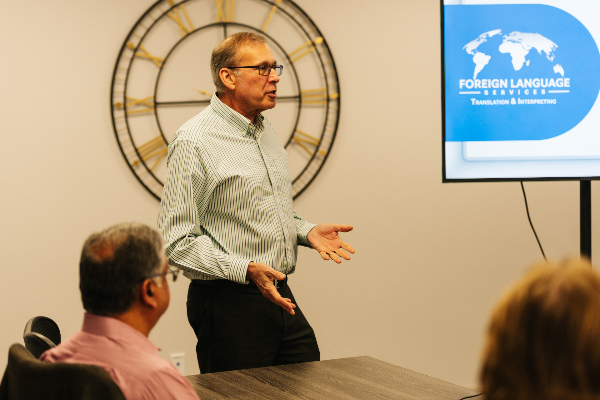 Business owners collaborating during a facilitated peer advisory board session in Huntsville